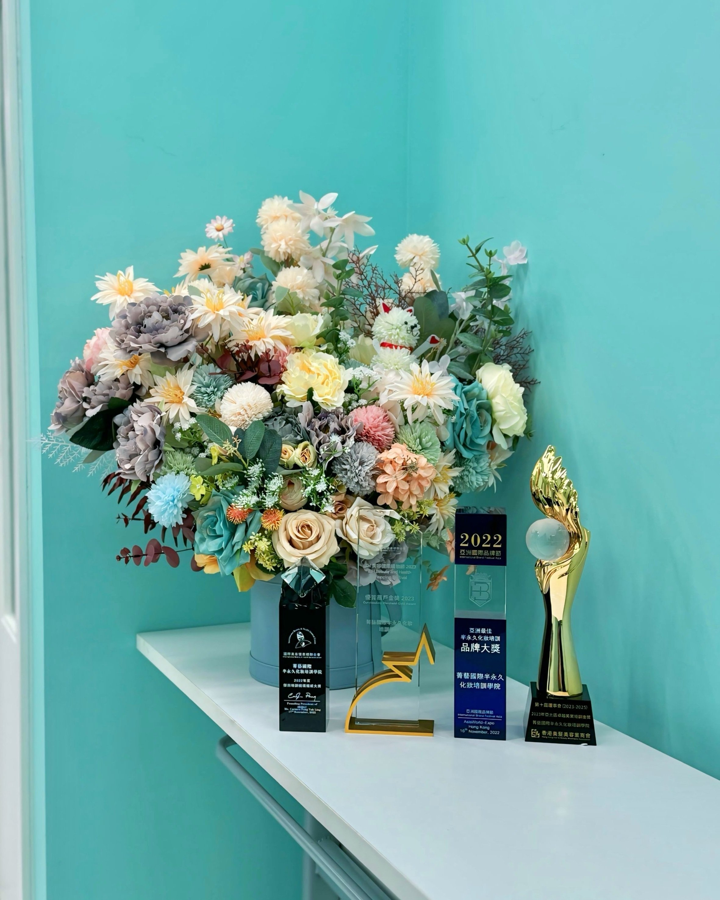 Award trophies and flowers
